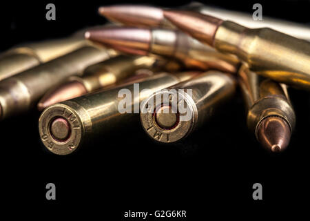 Rifle bullets close-up on black background Stock Photo