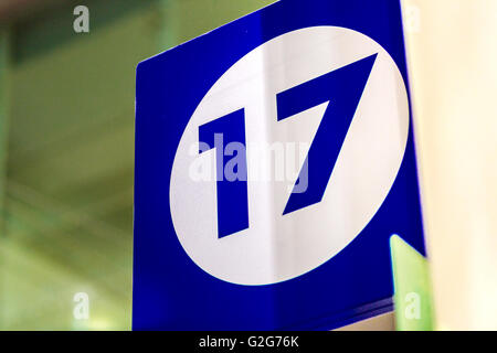 the number 17 on blue sign Stock Photo