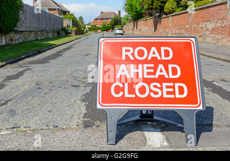 Road ahead closed sign on a road in the UK. Stock Photo