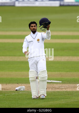 Sri Lanka's Dinesh Chandimal celebrates his 100 during day four of the Investec Second Test Match at the Emirates Riverside, Chester-Le-Street.