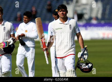 England's Alastair Cook walks off after winning the second test on day four of the Investec Second Test Match at the Emirates Riverside, Chester-Le-Street. Stock Photo