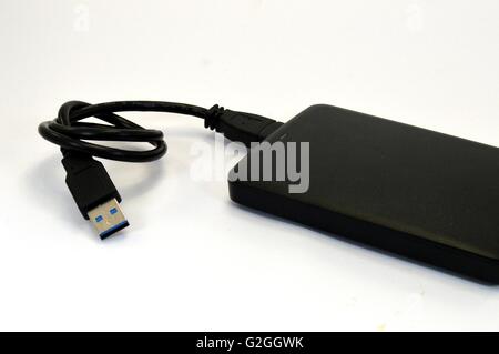 External hard disk of a black tetra of color. Stock Photo