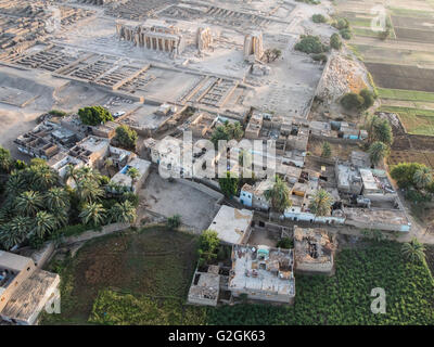 An aerial view of homes and the Ramesseum Temple on the west bank of the river Nile in Luxor, Egypt Stock Photo