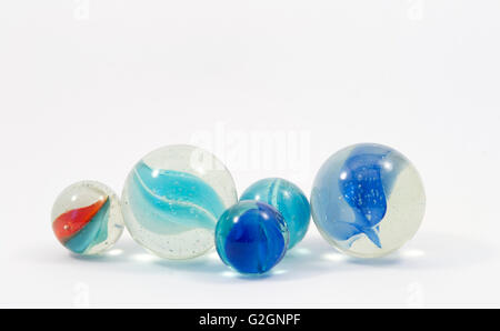 Game marbles in different colors and sizes Stock Photo