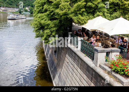 People in Prague Cafe Manes at Vltava river  Prague Czech Republic Stock Photo