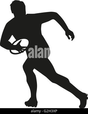 Rugby player running with ball Stock Photo