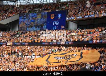 Huge Hull City flag in the crowd at Wembley stadium, London, with scoreboard surrounded by Tigers fans, 28th May 2016 Stock Photo