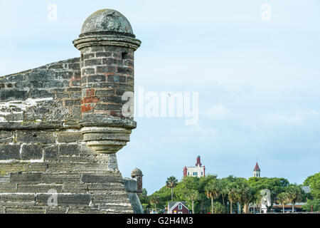 Coquina stone turret of Castillo de San Marcos fort with downtown St. Augustine, Florida in background. (USA) Stock Photo