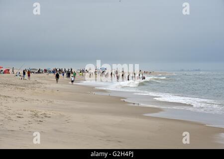 Tourists enjoying their time on the Assateague island beach in Maryland Stock Photo