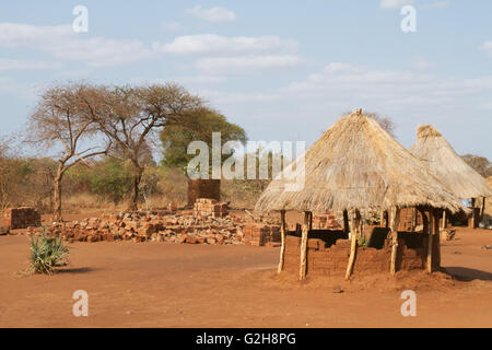 Hand-made bricks and thatched hut at the Chiawa Cultural Village on the Zambezi River in Zambia, Africa Stock Photo