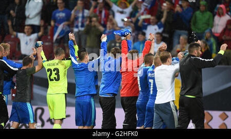 Augsburg, Germany. 29th May, 2016. The Slovakian players celebrate their victory after the international soccer match between Germany and Slovakia in the WWK Arena in Augsburg, Germany, 29 May 2016. Photo: Tobias Hase/dpa/Alamy Live News Stock Photo