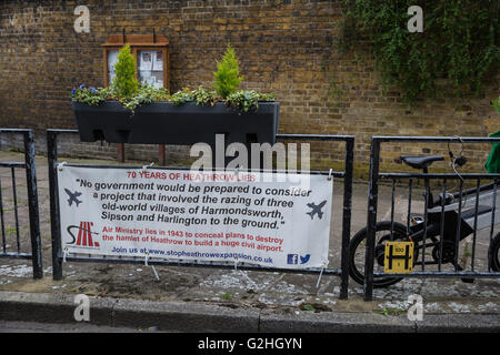 Harmondsworth, UK. 30th May, 2016. A Stop Heathrow Expansion banner in Harmondsworth village. Much of Harmondsworth would be flattened should plans for a 3rd runway be approved. Credit:  Mark Kerrison/Alamy Live News Stock Photo
