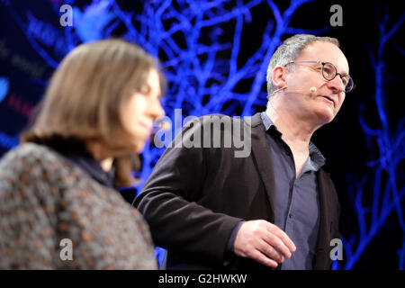 Hay Festival, Wales, UK - June 2016 -  Professor Gordon McMullan ( background ) from the Department of English at King's College London and Dr Katy Mair ( foreground ) Principal Records Specialist at the National Archives on stage with the presentation Talking About Shakespeare - by Me, William Shakespeare. Stock Photo