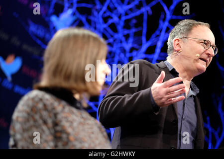 Hay Festival, Wales, UK - June 2016 -  Professor Gordon McMullan ( background ) from the Department of English at King's College London and Dr Katy Mair ( foreground ) Principal Records Specialist at the National Archives on stage with the presentation Talking About Shakespeare - by Me, William Shakespeare. Stock Photo