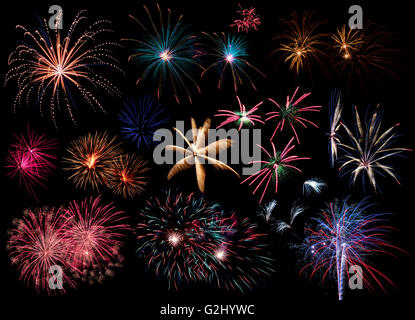 A collage or compilation of different Fireworks bursting, isolated on black background in high resolution Stock Photo