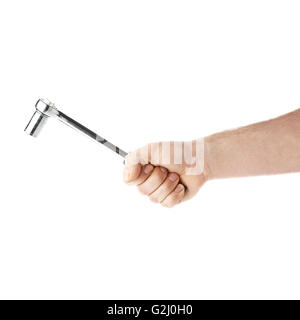 Hand holding a socket wrench tool, composition isolated over the white background Stock Photo
