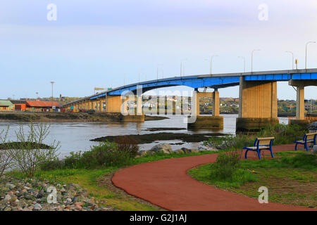 Bridge on the Bay of Fundy in Saint John New Brunswick, Canada at sunset Stock Photo