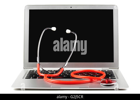 silver laptop diagnosis with black screen and red stethoscope  isolated on white background Stock Photo