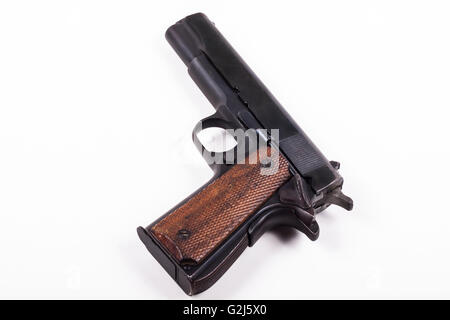 Old chrome pistol isolated on white background Stock Photo - Alamy