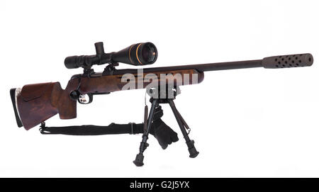 Sniper Rifle with scope atached on a tripod isolated on white background Stock Photo