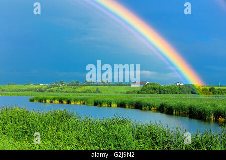 Rainbow after storm Stock Photo - Alamy