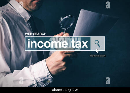 Web search bar glossary term - income tax definition in internet glossary. Stock Photo