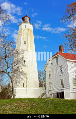 Sandy Hook Light tower and house. It is the oldest lighthouse still working now. Sandy Hook is located in Highlands in Monmouth County of New Jersey, USA Stock Photo