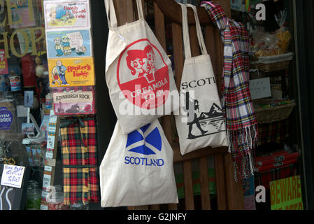 Tourist souvenir shop bags, scarves tartan ware Glasgow, Scotland, UK. Stock Photo