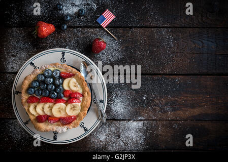 Sweet homemade pie with American flag on top,made with fruits Stock Photo