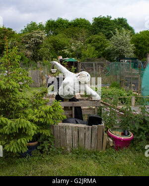 A scarecrow on an allotment site in Abingdon, Oxfordshire, UK Stock Photo