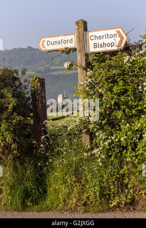 signpost near dunsford dartmoor national park,hedgerow style,footpath,church,fields in dartmoor national park,hedgerow style,foo Stock Photo