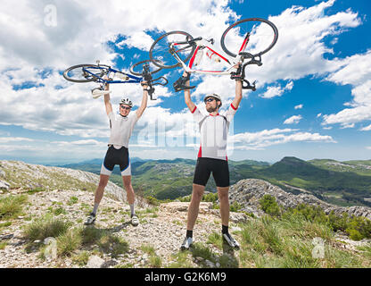 two cyclists on the top Stock Photo