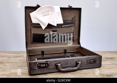 A studio photo of an old leather briefcase Stock Photo