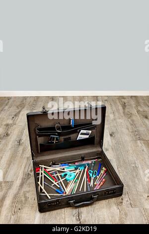 A studio photo of an old leather briefcase Stock Photo