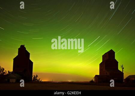 Grain elevator in ghost town with northern lights in the northern sky Lepine Saskatchewan Canada Stock Photo