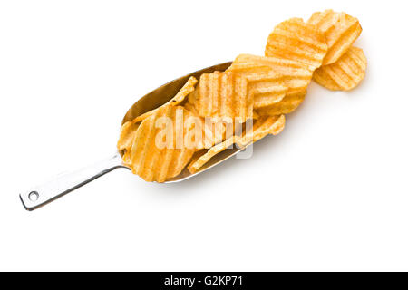 Crinkle cut potato chips isolated on white background. Tasty spicy potato chips in scoop. Stock Photo