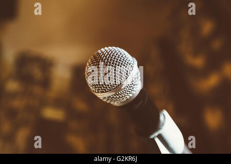 Photo of the dynamic microphone in the bar. Stock Photo