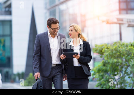 Business people meeting in financial district Stock Photo