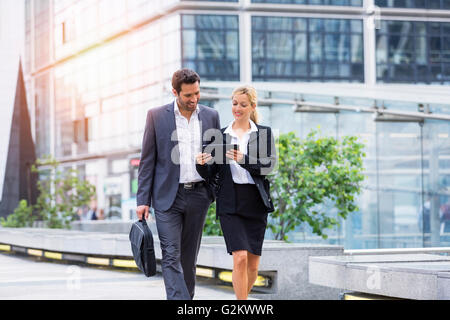 Business people meeting in financial district Stock Photo