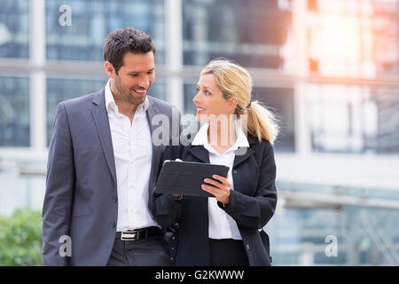 Business people meeting in financial district Stock Photo