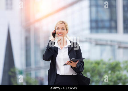 Businesswoman talking on the phone Stock Photo