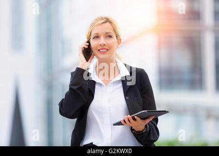 Businesswoman talking on the phone Stock Photo