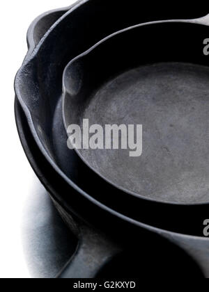 Three Old Cast Iron Pans Stock Photo