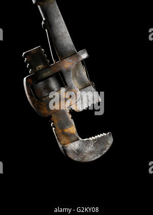 Old Pipe Wrench on Black Stock Photo