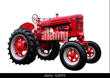 Big old red tractor isolated on white background Stock Photo