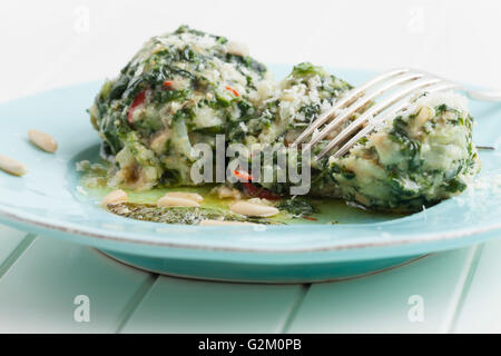 two italian strangolapreti spinach dumplings Stock Photo