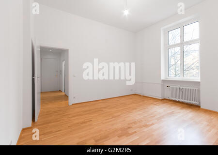 new renovated flat / apartment , white walls - wooden floor Stock Photo