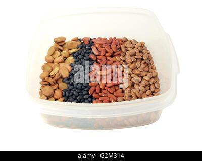 a assortment of dried fava beans, kidney beans, black beans and pinto beans in a container Stock Photo