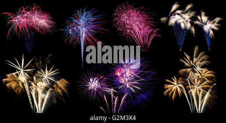 A collage or compilation of different Fireworks bursting, isolated on black background in high resolution Stock Photo