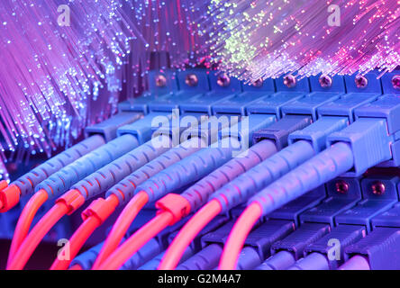 server with fiber optic cables in data center Stock Photo